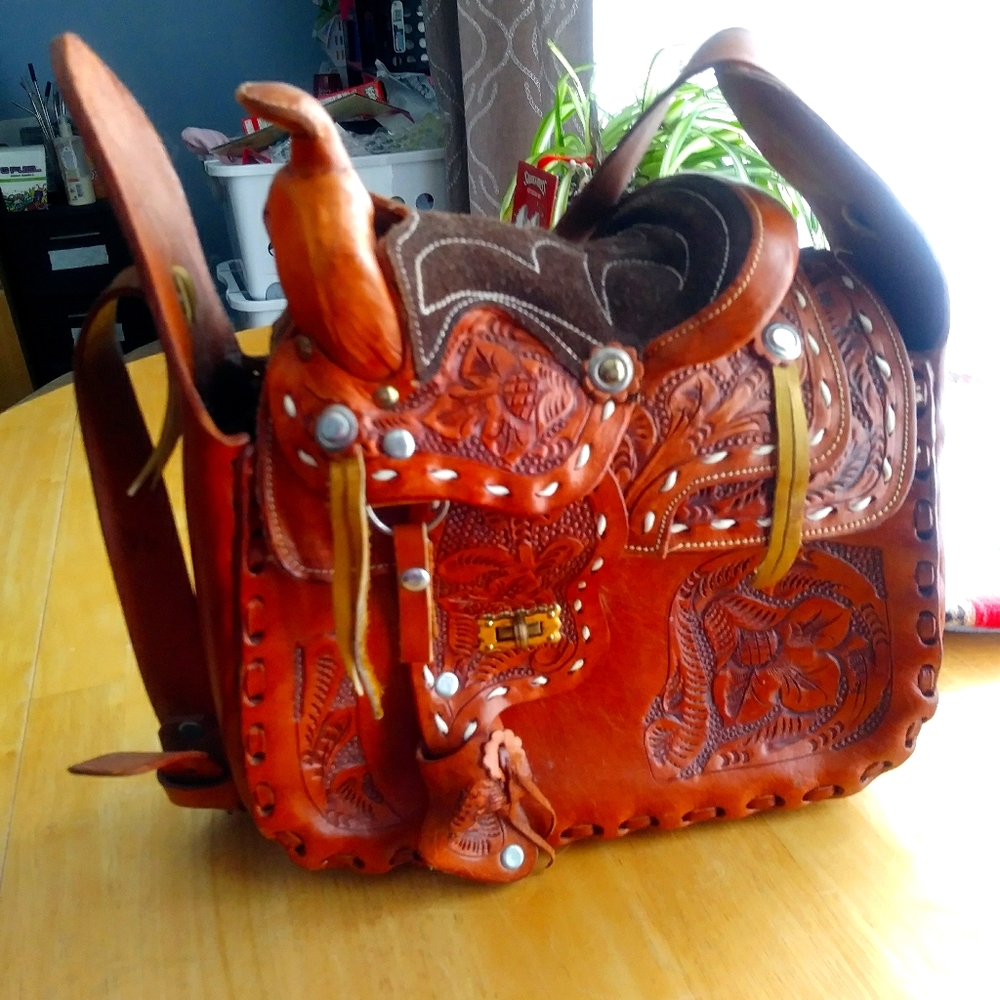 1950s handcrafted leather saddle purse